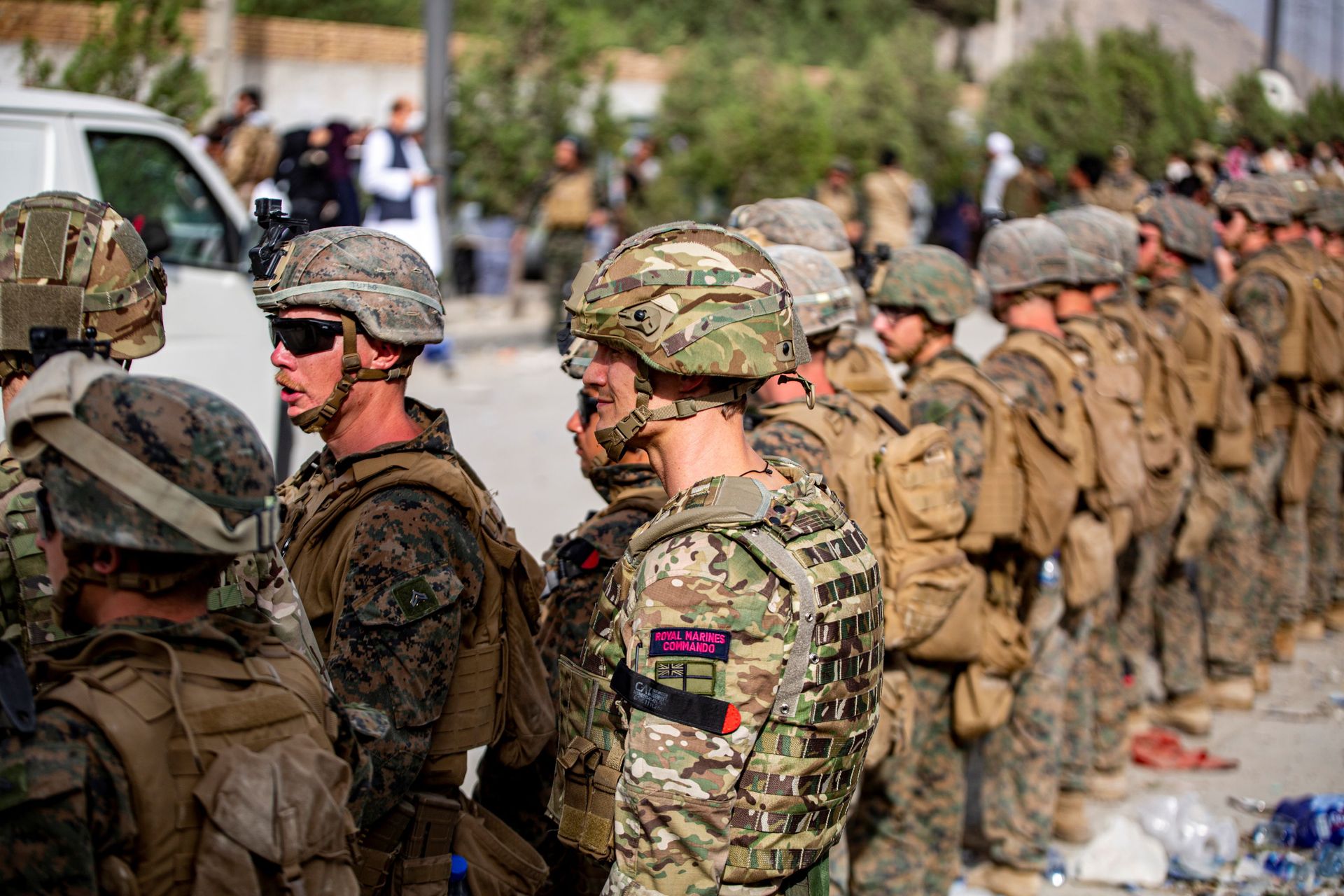 British Royal Marine Commandos and U.S. Marines assigned to the 24th Marine Expeditionary Unit work at an Evacuation Control Center (ECC) during an evacuation at Hamid Karzai International Airport, Kabul, Afghanistan, August 18, 2021 British Royal Marine Commandos and U.S. Marines assigned to the 24th Marine Expeditionary Unit work at an Evacuation Control Center (ECC) during an evacuation at Hamid Karzai International Airport, Kabul, Afghanistan, August 18, 2021 - Sputnik International, 1920, 07.09.2021