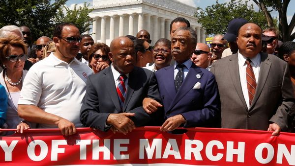 FILE PHOTO: Rev. Al Sharpton (2nd R) links arms with Rep. John Lewis (D-GA) next to Martin Luther King III (R) as they begin to march during the 50th anniversary of the 1963 March on Washington for Jobs and Freedom at the Lincoln Memorial in Washington August 24, 2013. FILE PHOTO: Rev. Al Sharpton (2nd R) links arms with Rep. John Lewis (D-GA) next to Martin Luther King III (R) as they begin to march during the 50th anniversary of the 1963 March on Washington for Jobs and Freedom at the Lincoln Memorial in Washington August 24, 2013. - Sputnik International