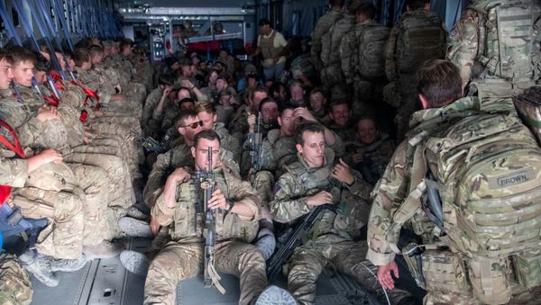 UK military personnel are seen onboard an A400M aircraft departing Kabul, Afghanistan, 28 August 2021. - Sputnik International