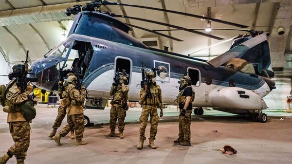 Taliban fighters storm into the Kabul International Airport, wielding American supplied weapons, equipment & uniforms – after the U.S. Military have completed their withdrawal. - Sputnik International