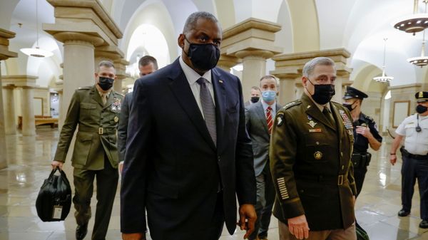 U.S. Defense Secretary Lloyd Austin and Chairman of the Joint Chiefs of Staff U.S. Army General Mark Milley depart after participating in a briefing on Afghanistan for the members of the House of Representatives at the U.S. Capitol in Washington, D.C., U.S. August 24, 2021 - Sputnik International