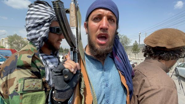 Taliban forces patrol near the entrance gate of Hamid Karzai International Airport, a day after U.S troops withdrawal, in Kabul - Sputnik International
