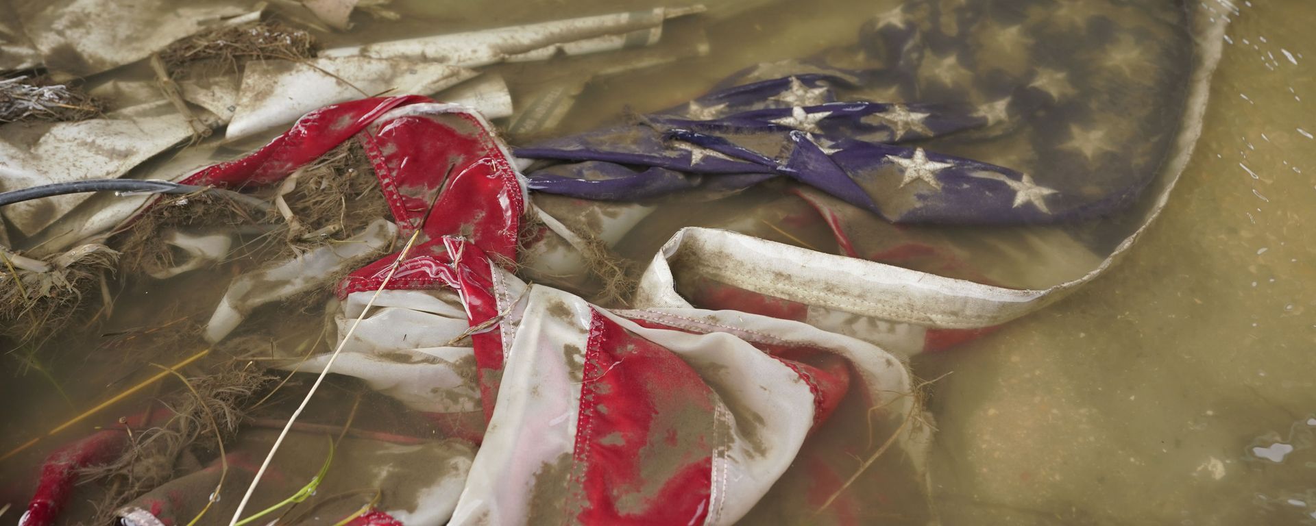 In the aftermath of Hurricane Ida, an American flag floats in a puddle of flood water Wednesday, Sept. 1, 2021, in Myrtle Grove, La. In the aftermath of Hurricane Ida, an American flag floats in a puddle of flood water Wednesday, Sept. 1, 2021, in Myrtle Grove, La. - Sputnik International, 1920, 13.10.2021