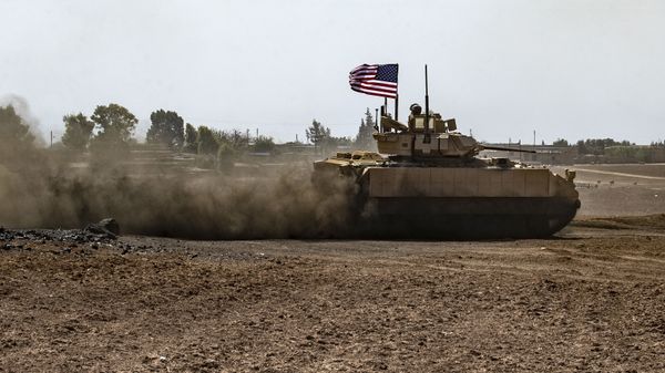 US soldiers patrol in the Syrian village of Jawadiyah, in the northeastern Hasakeh province, near the border with Turkey on August 30, 2021.  - Sputnik International