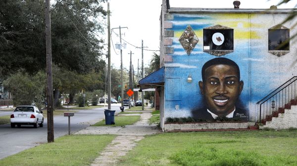 A mural depicts shot Black man Ahmaud Arbery as a Black History Month Memorial Ride is held in memory of those who have died through race-related violence, in Brunswick, Georgia, U.S., February 27, 2021. - Sputnik International