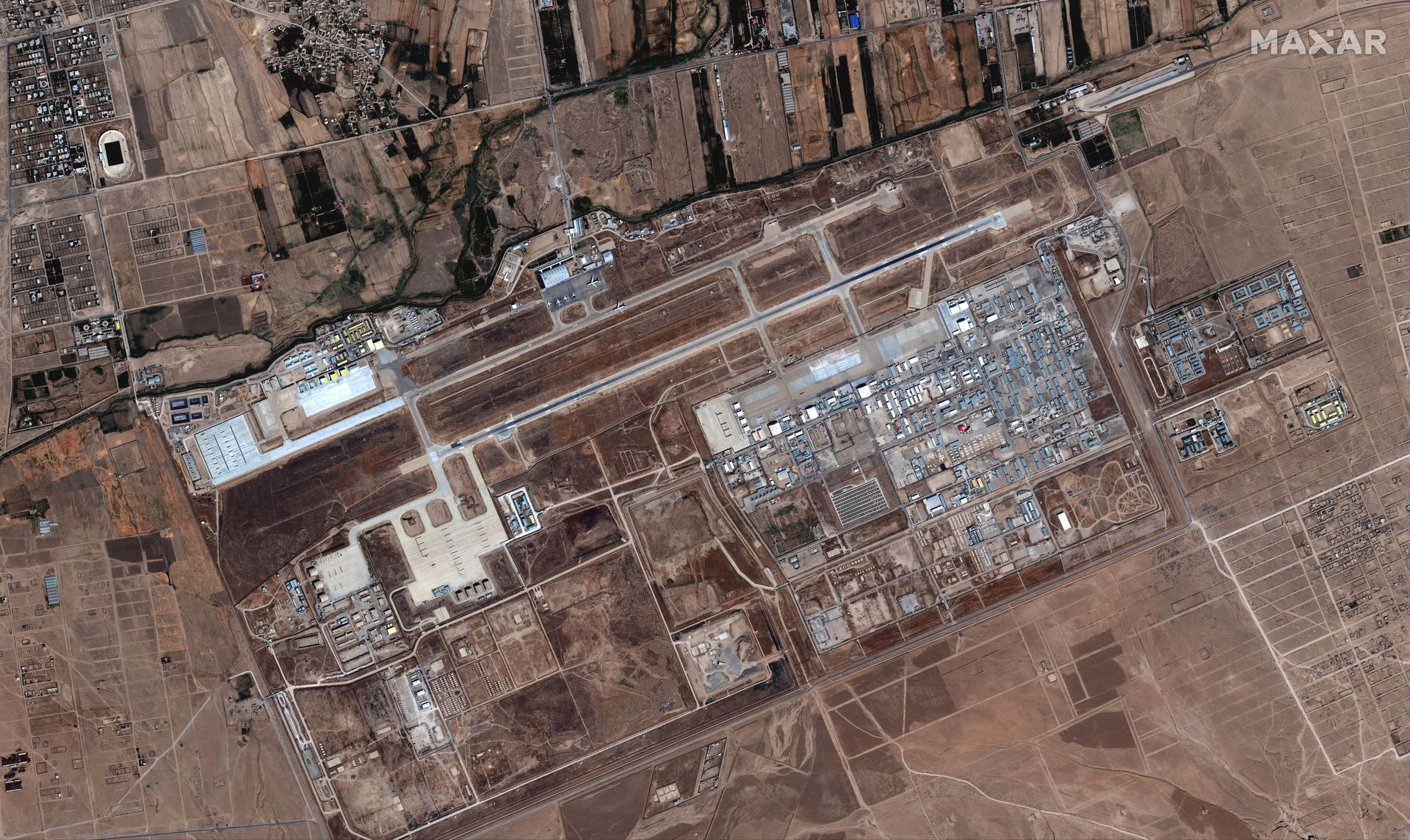 Six commercial airplanes are seen near the main terminal of the Mazar-i-Sharif airport, in northern Afghanistan, September 3 2021. Picture taken September 3, 2021. Six commercial airplanes are seen near the main terminal of the Mazar-i-Sharif airport, in northern Afghanistan, September 3 2021. Picture taken September 3, 2021. - Sputnik International, 1920, 07.09.2021