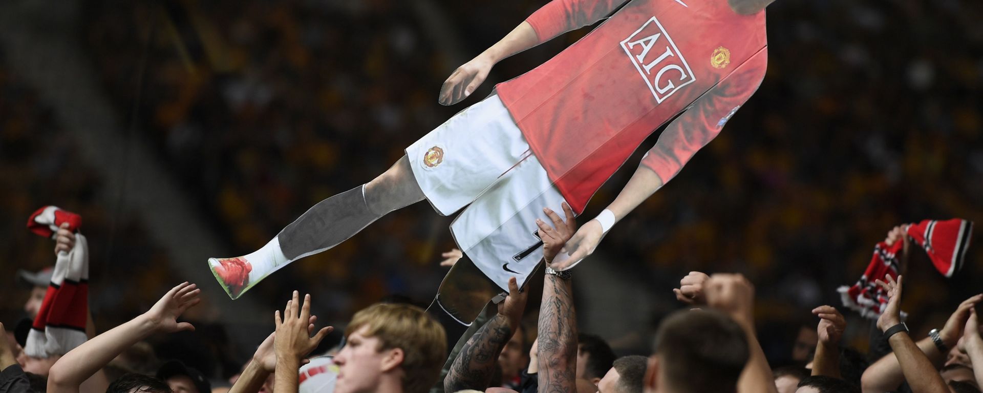 Soccer Football - Premier League - Wolverhampton Wanderers v Manchester United - Molineux Stadium, Wolverhampton, Britain - 29 August 2021 General view of Manchester United fans holding up a cardboard cut out of Cristiano Ronaldo Soccer Football - Premier League - Wolverhampton Wanderers v Manchester United - Molineux Stadium, Wolverhampton, Britain - 29 August 2021 General view of Manchester United fans holding up a cardboard cut out of Cristiano Ronaldo - Sputnik International, 1920, 06.09.2021
