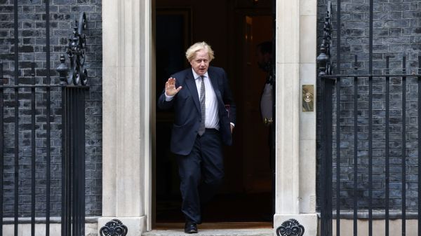 Britain's Prime Minister Boris Johnson waves as he walks on Downing Street in London, Britain, August 24, 2021. - Sputnik International