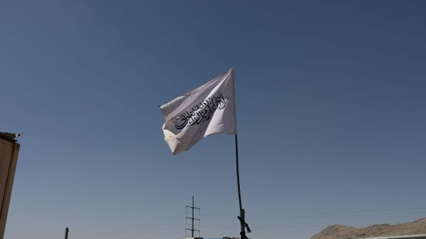 The flag of the Islamic Emirate of Afghanistan (Taliban) is raised at the military airfield in Kabul, Afghanistan, September 5, 2021. - Sputnik International