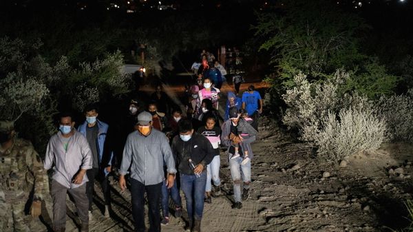 Asylum-seeking migrant families are escorted out of a private property by the U.S. National Guard after crossing the Rio Grande river into the United States from Mexico in Roma, Texas, U.S., August 14, 2021 Asylum-seeking migrant families are escorted out of a private property by the U.S. National Guard after crossing the Rio Grande river into the United States from Mexico in Roma, Texas, U.S., August 14, 2021 - Sputnik International