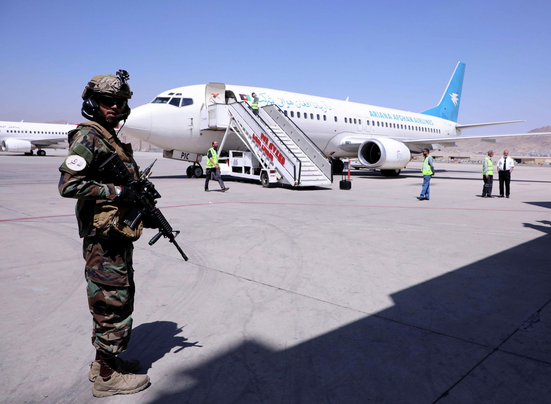 A member of Taliban forces stands guard next to a plane that has arrived from Kandahar at Hamid Karzai International Airport in Kabul, Afghanistan September 5, 2021. REUTERS/Stringer/File Photo A member of Taliban forces stands guard next to a plane that has arrived from Kandahar at Hamid Karzai International Airport in Kabul, Afghanistan September 5, 2021. REUTERS/Stringer/File Photo - Sputnik International, 1920, 09.09.2021