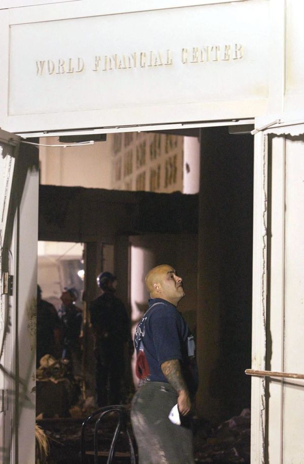 A firemen walks through the destroyed lobby of the World Financial Center near the World Trade Center in New York, on 12 September, 2001. - Sputnik International