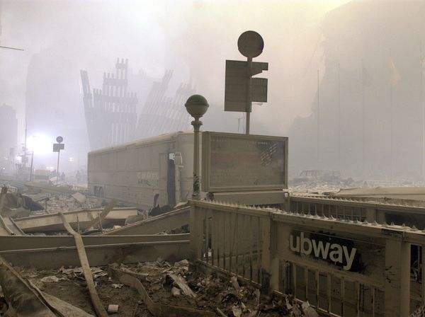 Destroyed mullions, the vertical struts which once faced the soaring outer walls of the World Trade Center towers, are all that is left behind a dust covered bus and subway entrance, after a terrorist attack on the twin towers of lower Manhattan on Tuesday, 11 September 2001. - Sputnik International