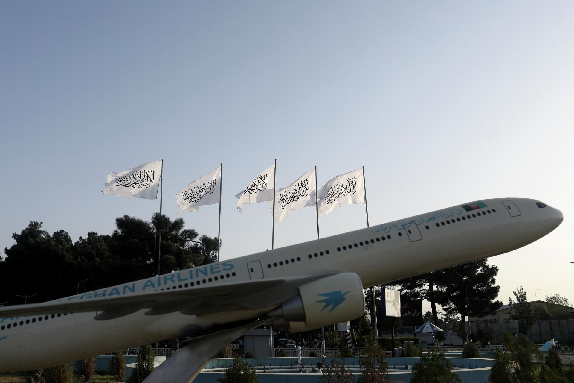 A view shows flags of the Islamic Emirate of Afghanistan at the international airport in Kabul, Afghanistan, September 9, 2021. A view shows flags of the Islamic Emirate of Afghanistan at the international airport in Kabul, Afghanistan, September 9, 2021. - Sputnik International, 1920, 09.09.2021