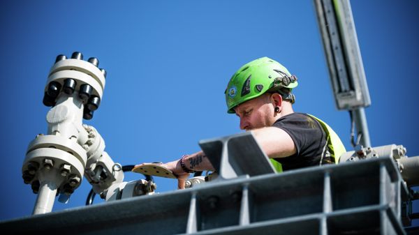 A Nord Stream 2 employee stands on a platform in the Nord Stream 2 Baltic Sea pipeline's receiving station, where six and a half million cubic meters of natural gas per hour will be processed and delivered to downstream pipelines at the right pressure, in Lubmin, Germany - Sputnik International