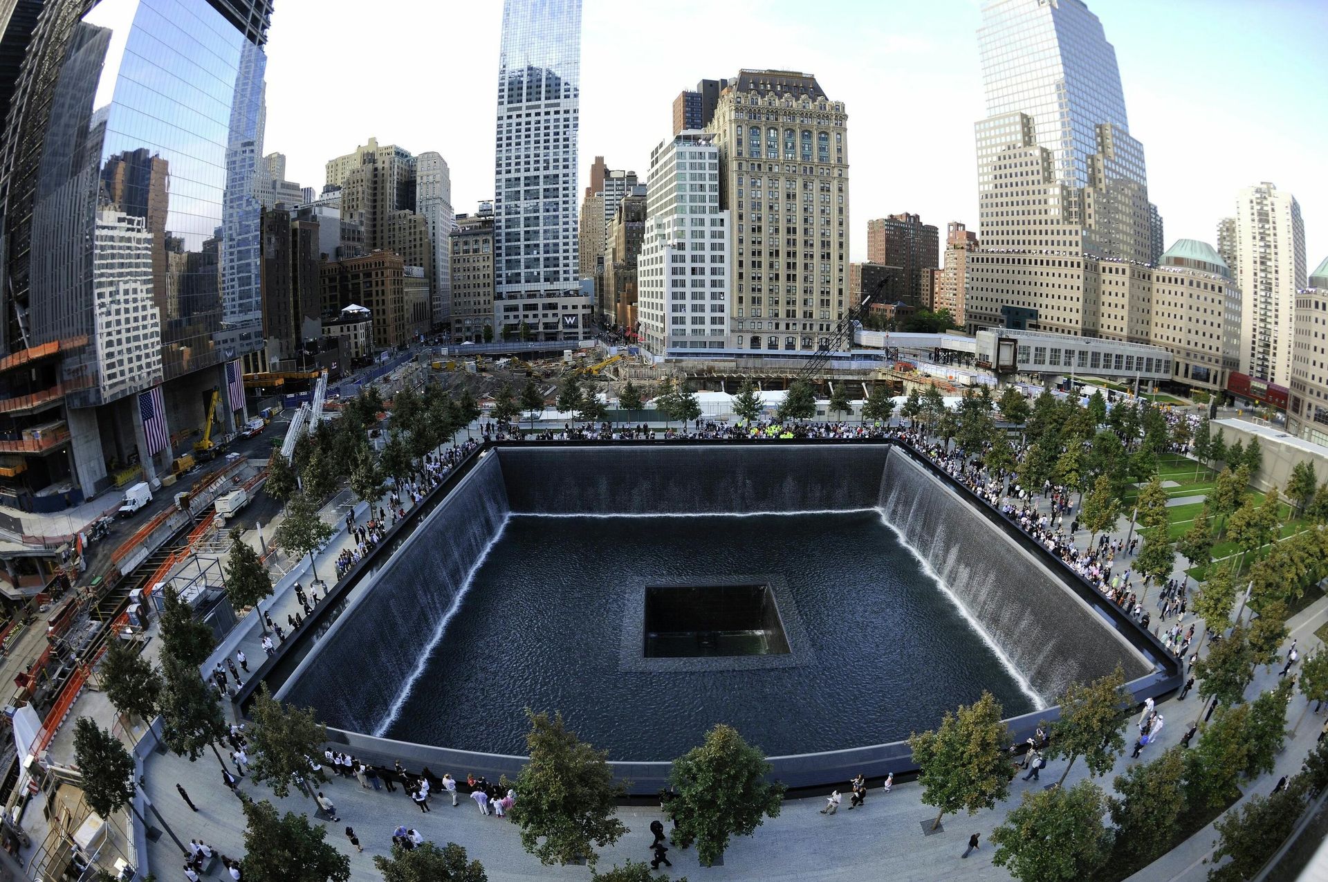 Families visit the South Memorial Pool during tenth anniversary ceremonies at the World Trade Center site in New York, U.S., September 11, 2011 Families visit the South Memorial Pool during tenth anniversary ceremonies at the World Trade Center site in New York, U.S., September 11, 2011 - Sputnik International, 1920, 11.09.2021