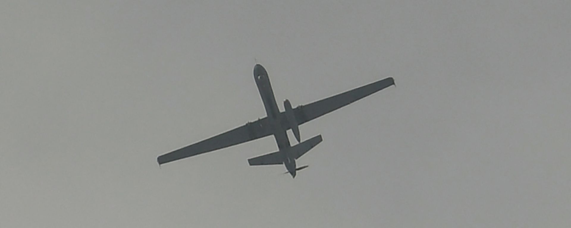 A drone flies over the airport in Kabul on August 31, 2021. - The US military announced it has completed its withdrawal from Afghanistan after a brutal 20-year war -- one that started and ended with the hardline Islamist Taliban in power, despite billions of dollars spent trying to rebuild the conflict-wracked country. A drone flies over the airport in Kabul on August 31, 2021. - The US military announced it has completed its withdrawal from Afghanistan after a brutal 20-year war -- one that started and ended with the hardline Islamist Taliban in power, despite billions of dollars spent trying to rebuild the conflict-wracked country. - Sputnik International, 1920, 06.12.2021