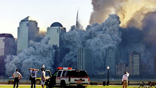 FILE PHOTO: The remaining tower of New York's World Trade Center, Tower 2, dissolves in a cloud of dust and debris about half an hour after the first twin tower collapsed, as seen from Jersey City, New Jersey, U.S. September 11, 2001.  - Sputnik International