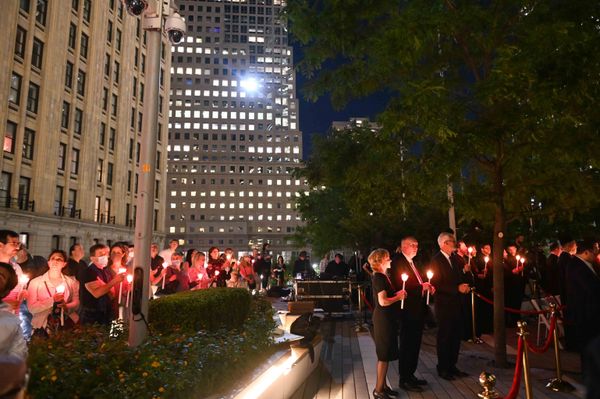 People hold candles as they attend a religious 9/11 commemoration ceremony at the Greek Orthodox St. Nicholas National Shrine adjacent to the 9/11 Memorial & Museum in New York City on 10 September 2021. People hold candles as they attend a religious 9/11 commemoration ceremony at the Greek Orthodox St. Nicholas National Shrine adjacent to the 9/11 Memorial & Museum in New York City on 10 September 2021. - Sputnik International