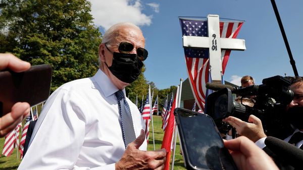 U.S. President Joe Biden talks with reporters outside the Shanksville volunteer fire station, as he and first lady Jill Biden stopped at the fire hall after visiting the nearby site where the hijacked United Airlines Flight 93 plane crashed on the 20th anniversary of the September 11, 2001 attacks, in Shanksville, Pennsylvania, U.S., September 11, 2021. - Sputnik International