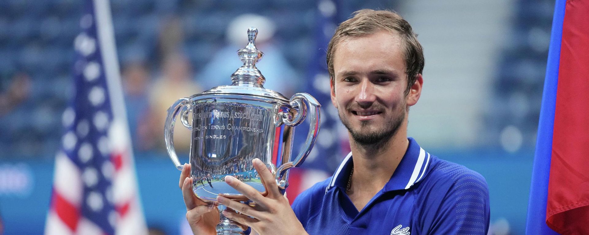 Sep 12, 2021; Flushing, NY, USA; Daniil Medvedev of Russia celebrates with the championship trophy after his match against Novak Djokovic of Serbia (not pictured) in the men's singles final on day fourteen of the 2021 U.S. Open tennis tournament at USTA Billie Jean King National Tennis Center. Sep 12, 2021; Flushing, NY, USA; Daniil Medvedev of Russia celebrates with the championship trophy after his match against Novak Djokovic of Serbia (not pictured) in the men's singles final on day fourteen of the 2021 U.S. Open tennis tournament at USTA Billie Jean King National Tennis Center. - Sputnik International, 1920, 12.09.2021
