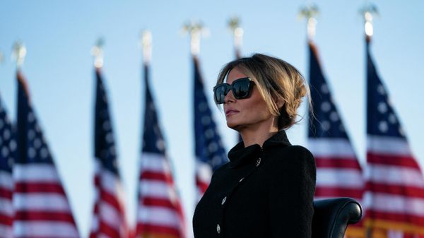 Melania Trump listens as her husband Outgoing US President Donald Trump addresses guests at Joint Base Andrews in Maryland on January 20, 2021 Melania Trump listens as her husband Outgoing US President Donald Trump addresses guests at Joint Base Andrews in Maryland on January 20, 2021 - Sputnik International