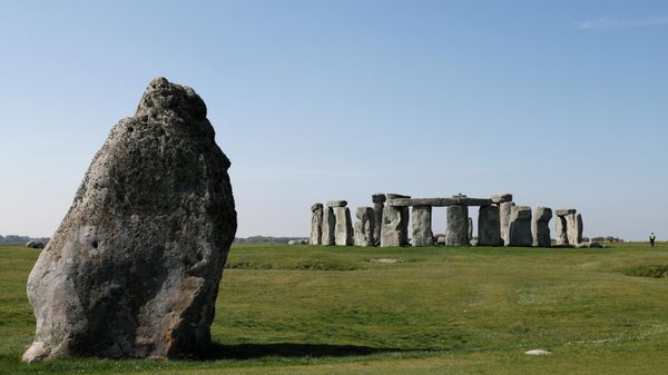 Security guards patrol the prehistoric monument at Stonehenge in southern England, on April 26, 2020, closed during the national lockdown due to the novel coronavirus COVID-19 pandemic - Sputnik International