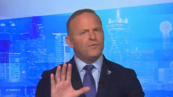 Screenshot captures Newsmax host Grant Stinchfield moments after yelling at producers to cut a US military vet from his show after he critiqued former US President Donald Trump over his handling of the Afghanistan withdrawal. - Sputnik International