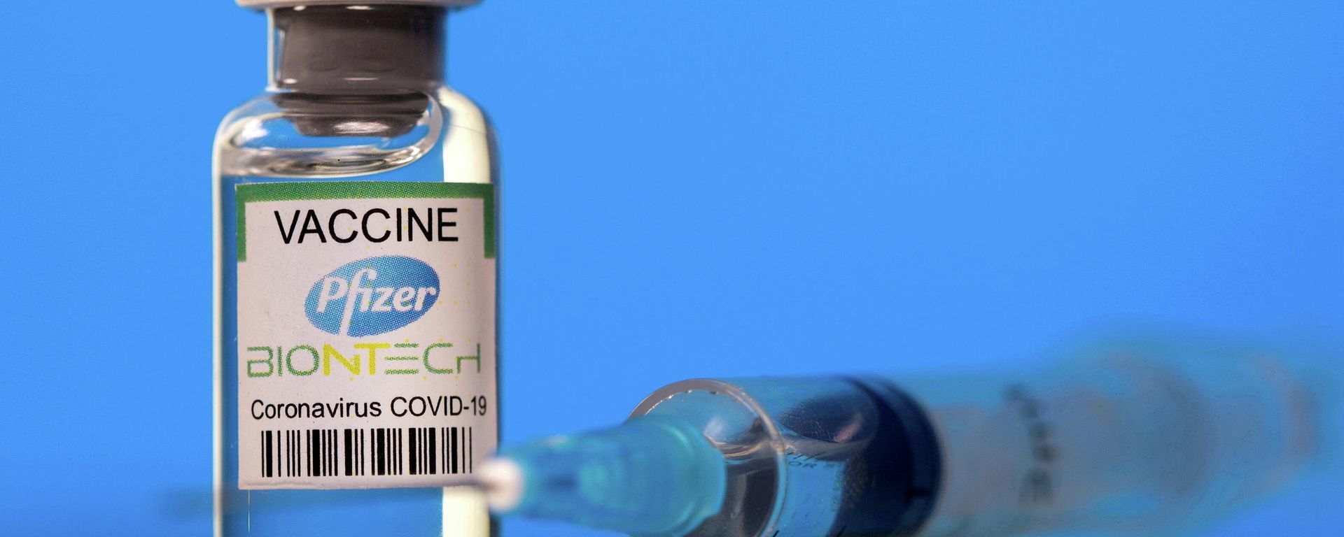 A vial labelled with the Pfizer-BioNTech coronavirus disease (COVID-19) vaccine is seen in this illustration picture taken March 19, 2021. A vial labelled with the Pfizer-BioNTech coronavirus disease (COVID-19) vaccine is seen in this illustration picture taken March 19, 2021. - Sputnik International, 1920, 28.09.2021