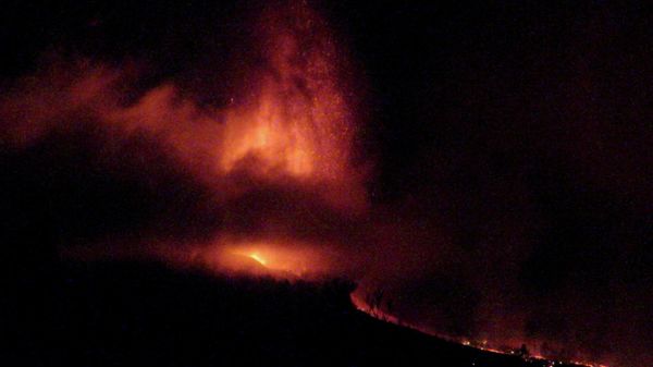 Lava flows down the hill after a volcanic eruption in La Palma, Canary Islands, Spain, September 19, 2021, in this still image from video obtained via social media. - Sputnik International