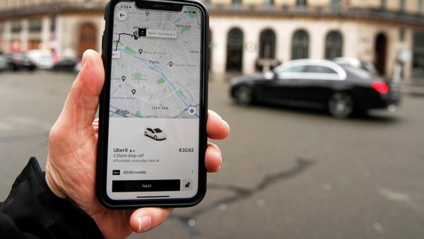 A photo Illustration shows the Uber application on a mobile phone in in central Paris, France March 5, 2020. - Sputnik International