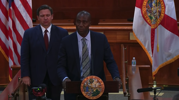 Screenshot captures Dr. Joseph Ladapo moments after Florida Gov. Ron DeSantis announces his appointment as the state's next surgeon general.  - Sputnik International