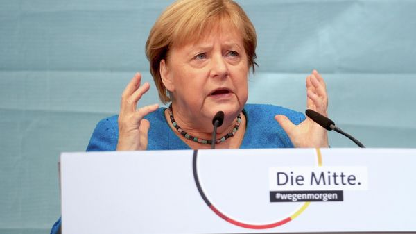 German Chancellor Angela Merkel together with North Rhine-Westphalia State Premier, Christian Democratic Union (CDU) party leader and candidate for chancellor Armin Laschet, attends a rally ahead of the September 26 general election , in Aachen, Germany, September 25, 2021. - Sputnik International