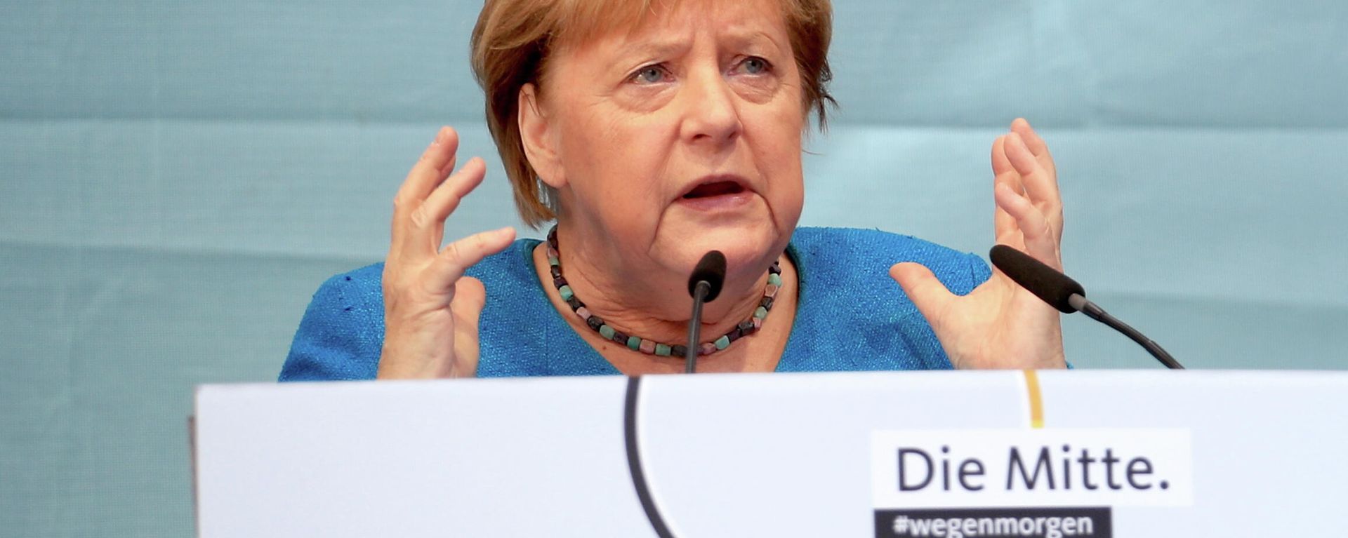 German Chancellor Angela Merkel together with North Rhine-Westphalia State Premier, Christian Democratic Union (CDU) party leader and candidate for chancellor Armin Laschet, attends a rally ahead of the September 26 general election , in Aachen, Germany, September 25, 2021. German Chancellor Angela Merkel together with North Rhine-Westphalia State Premier, Christian Democratic Union (CDU) party leader and candidate for chancellor Armin Laschet, attends a rally ahead of the September 26 general election , in Aachen, Germany, September 25, 2021. - Sputnik International, 1920, 25.09.2021
