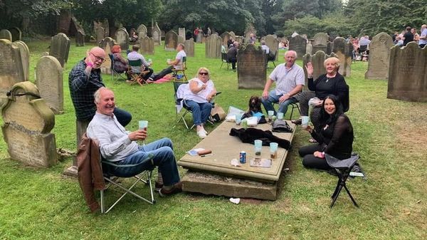 St. Mary's Church beer festival goers enjoy beverage in the church's graveyard. St. Mary's Church beer festival goers enjoy beverage in the church's graveyard. - Sputnik International