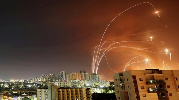 Streaks of light are seen as Israel's Iron Dome anti-missile system intercepts rockets launched from the Gaza Strip towards Israel, as seen from Ashkelon, Israel, May 12.  - Sputnik International