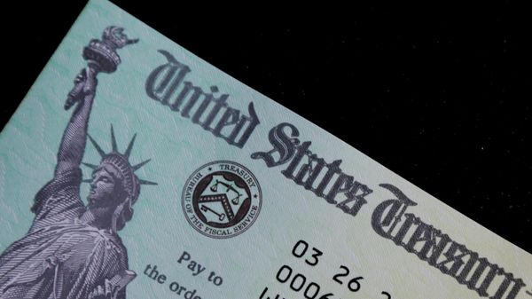 A family's stimulus check from the U.S. Treasury for the coronavirus disease (COVID-19) aid arrived in the mail in Milton, Massachusetts, U.S., March 25, 2021 - Sputnik International