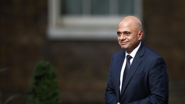 Britain's Secretary of State for Health and Social Care Sajid Javid walks outside Downing Street in London - Sputnik International