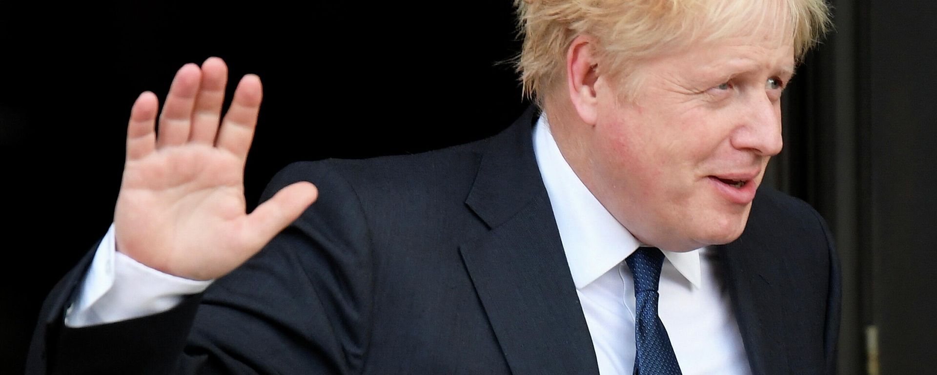 Britain's Prime Minister Boris Johnson gestures as he walks out of his hotel during the annual Conservative Party conference, in Manchester, Britain, October 3, 2021 Britain's Prime Minister Boris Johnson gestures as he walks out of his hotel during the annual Conservative Party conference, in Manchester, Britain, October 3, 2021 - Sputnik International, 1920, 03.10.2021