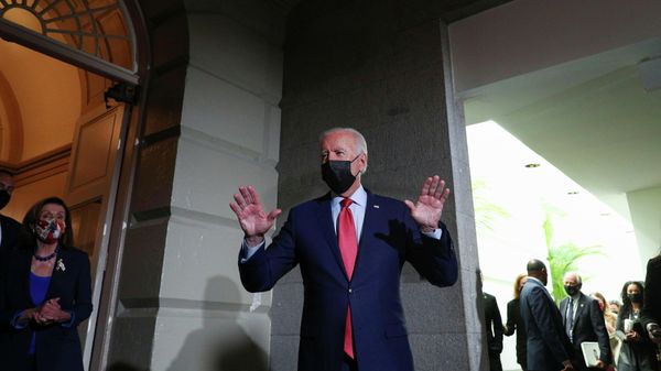 U.S. President Joe Biden talks to reporters while Speaker of the House Nancy Pelosi listens as they depart after the president and the speaker met with Democratic lawmakers at the U.S. Capitol to promote his bipartisan infrastructure bill on Capitol Hill in Washington, U.S., October 1, 2021 - Sputnik International