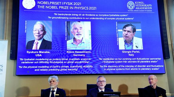 Member of the Nobel Committee for Physics Thors Hans Hansson, Secretary General of the Royal Swedish Academy of Sciences Goran K. Hansson, and member of the Nobel Committee for Physics John Wettlaufer announce the winners of the 2021 Nobel Prize in Physics at the Royal Swedish Academy of Sciences in Stockholm, Sweden October 5, 2021 - Sputnik International