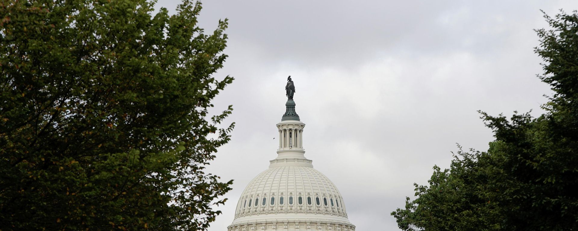 The U.S. Capitol is seen as Senate Democrats and Republicans sought to reach an agreement on to avert a debt crisis in Washington, U.S., October 7, 2021. The U.S. Capitol is seen as Senate Democrats and Republicans sought to reach an agreement on to avert a debt crisis in Washington, U.S., October 7, 2021. - Sputnik International, 1920, 06.11.2021