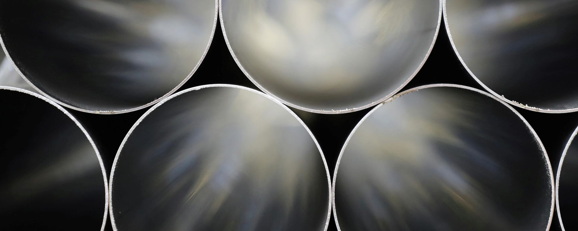 FILE PHOTO: Stainless steel tubes are stored ready to be made into exhausts at the Eminox factory, during a post-Budget visit by Britain's Chancellor of the Exchequer Philip Hammond, in Gainsborough, FILE PHOTO: Stainless steel tubes are stored ready to be made into exhausts at the Eminox factory, during a post-Budget visit by Britain's Chancellor of the Exchequer Philip Hammond, in Gainsborough, - Sputnik International, 1920, 11.10.2021