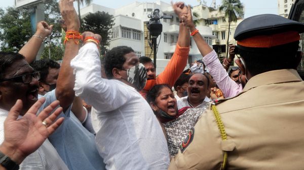 Shiv Sena party workers shout slogans during a state-wide strike in Maharashtra against last week’s violence in Uttar Pradesh state in Mumbai, India, Monday, Oct. 11, 2021. Four farmers died last week when a car owned a junior minister in Prime Minister Narendra Modi’s government ran over a group of protesting farmers in Lakhimpur Kheri, a town in Uttar Pradesh state - Sputnik International