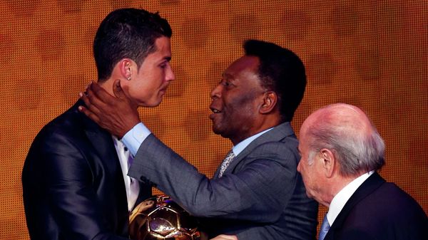 Portugal's Cristiano Ronaldo is congratulated by Pele after being awarded the FIFA Ballon d'Or 2013 in Zurich January 13, 2014 Portugal's Cristiano Ronaldo is congratulated by Pele after being awarded the FIFA Ballon d'Or 2013 in Zurich January 13, 2014 - Sputnik International