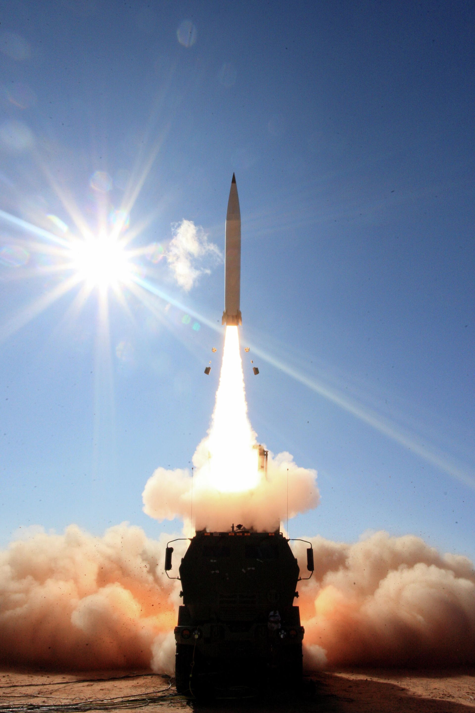 An M142 High Mobility Artillery Rocket System launches a Precision Strike Missile on Dec. 10, 2019, at White Sands Missile Range, New Mexico. HIMARS is one of the Army’s front-running munitions that addresses Long Range Precision Fires. - Sputnik International, 1920, 14.10.2021