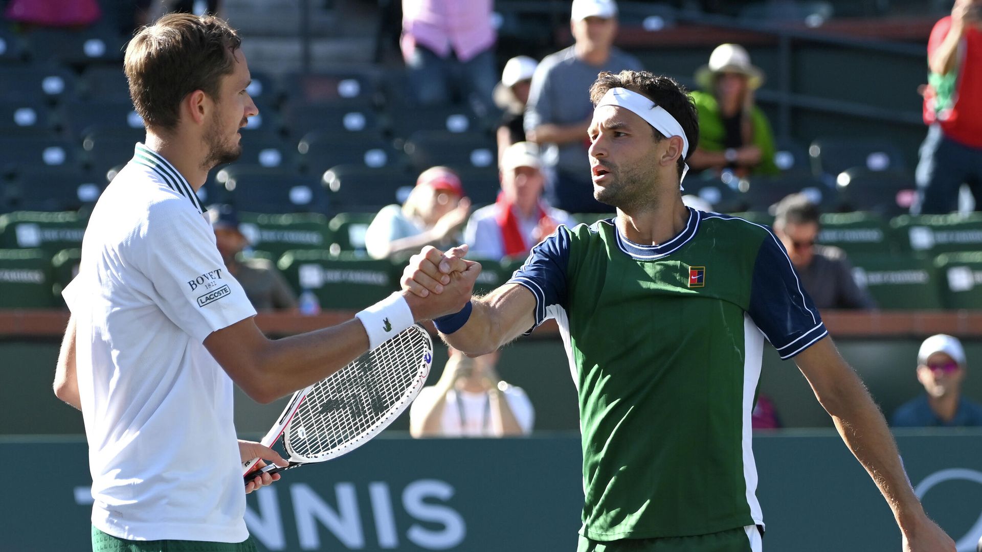 Oct 13, 2021; Indian Wells, CA, USA; Daniil Medvedev (RUS) shakes hands with Grigor Dimitrov (BUL) after their fourth round match during the BNP Paribas Open at the Indian Wells Tennis Garden Oct 13, 2021; Indian Wells, CA, USA; Daniil Medvedev (RUS) shakes hands with Grigor Dimitrov (BUL) after their fourth round match during the BNP Paribas Open at the Indian Wells Tennis Garden - Sputnik International, 1920, 14.10.2021