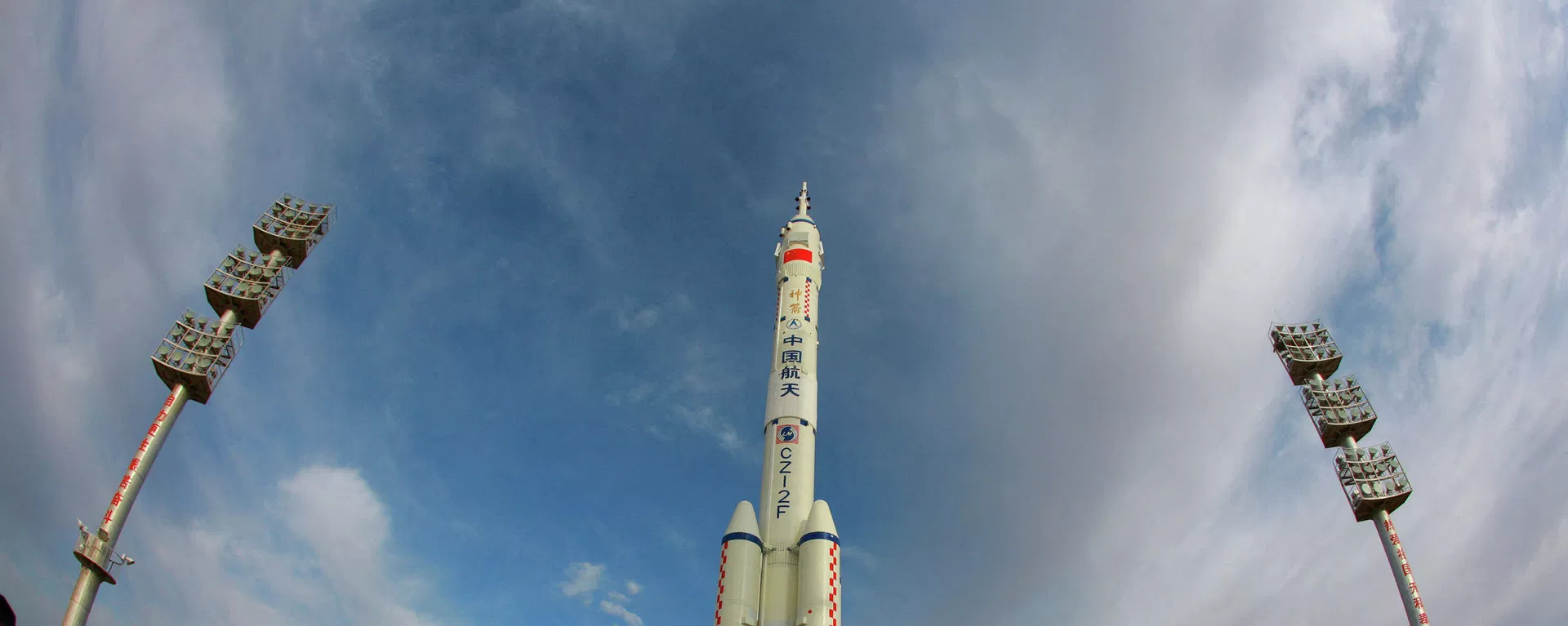 This photo taken on October 7, 2021 shows a Long March-2F carrier rocket, carrying the Shenzhou-13 spacecraft, being transported to the launching area at the Jiuquan Satellite Launch Centre in the country's northwestern Gansu province. - Sputnik International, 1920, 30.03.2022