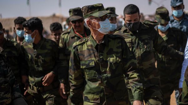 Brahim Ghali, head of the Polisario Front and the self-declared Sahrawi Democratic Arab Republic, center, attends a National Unity Day event in the Dajla refugee camp, Algeria, Tuesday, Oct. 12, 2021. - Sputnik International