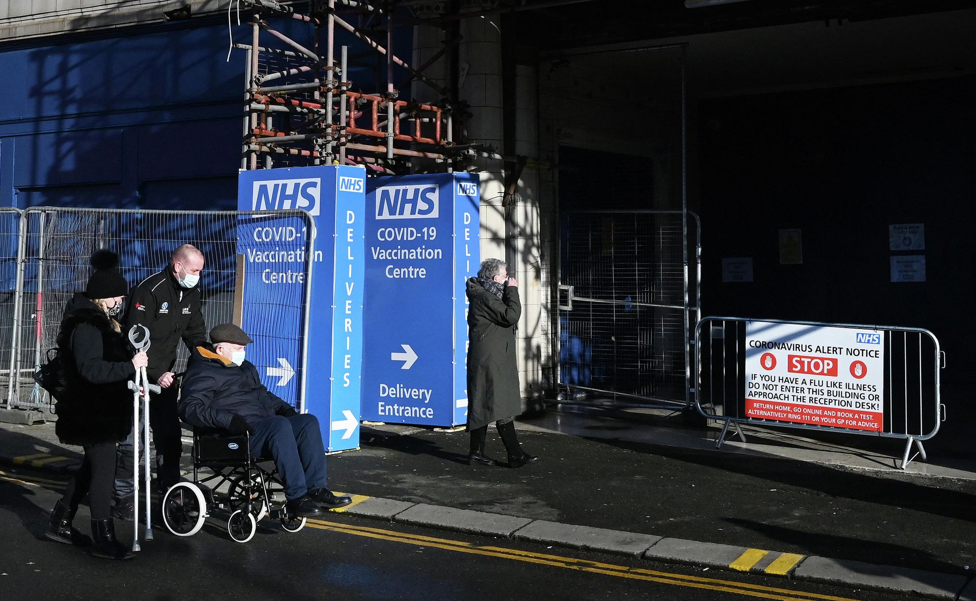 NHS signage is pictured outside the historic Winter Gardens venue in Blackpool, northwest England, on January 25, 2021 which has been converted for use as a vaccination centre NHS signage is pictured outside the historic Winter Gardens venue in Blackpool, northwest England, on January 25, 2021 which has been converted for use as a vaccination centre - Sputnik International, 1920, 24.10.2021